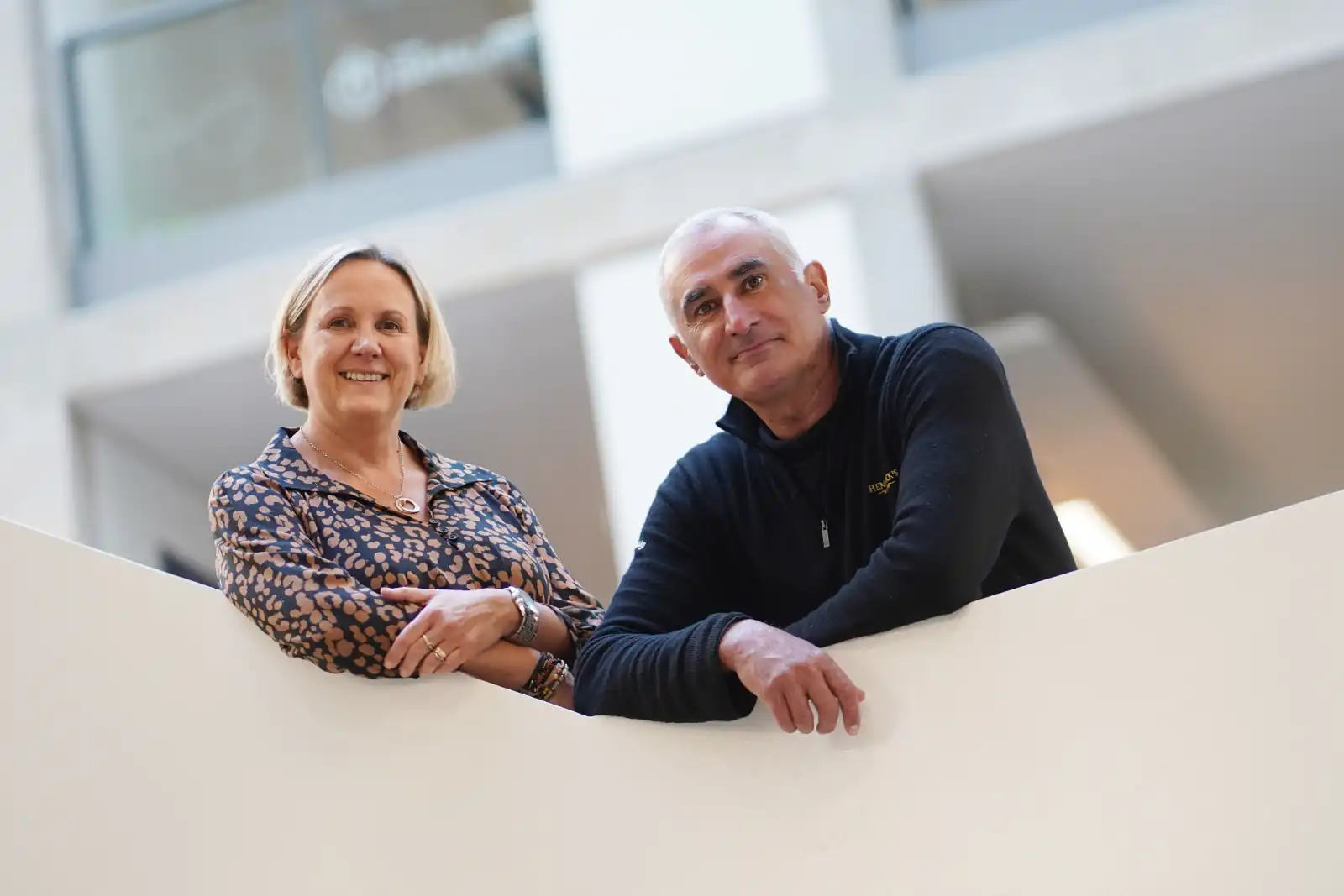 ivvi founders standing on a balcony for press release